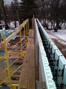 mainfloor icf is ready for pouring, horizontal rebar in icf forms is placed and walls are reinforced.