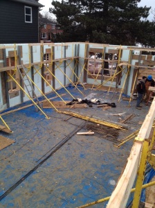 site is ready for pouring. braces and scaffolding are up, window bucks and plywood reinforcement are in place